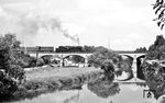 Mit einem Güterzug fährt 023 074 über die Jagstbrücke in Crailsheim. (26.06.1971) <i>Foto: Burkhard Wollny</i>