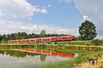 An den Geisteichen bei Wiesau (Oberpf) war der Aufenthalt ohne die nervigen Mücken etwas angenehmer. Dort brummt 218 421 mit RE 4854 nach Hof vorbei. (22.06.2026) <i>Foto: Joachim Bügel</i>