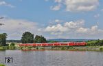 218 433 mit RE 4865 (München - Hof) in der Mittagshitze von 34 Grad am Rechenweiher bei Escheldorf. (22.06.2026) <i>Foto: Joachim Bügel</i>