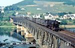 044 250-9 (Bw Koblenz Mosel) rumpelt mit einem Stemi-Kokszug über die Moselbrücke bei Bullay. Anschließend geht es in den 459 m langen Prinzenkopftunnel. (05.1971) <i>Foto: Robin Fell</i>