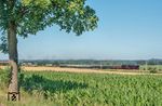 Nach dem Wasserhalt in Dinkelscherben eilt 01 1104 mit DRC 93515 nach Freilassing durch den schwäbischen Landkreis Augsburg bei Kutzenhausen. (04.07.2026) <i>Foto: Joachim Schmidt</i>