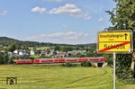 Bei Pechbrunn brummt 218 428 mit RE 4860 nach Hof dem nächsten Halt in Marktredwitz entgegen. (24.06.2026) <i>Foto: Joachim Bügel</i>