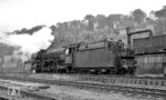 03 1001 vom Bw Hagen-Eckesey war mit dem E 429 nach Kassel gekommen und rückt in das Bw ein. Obwohl die Baureihe 03.10 mit geschweißten Kessel mit Verbrennungskammer, Rollenlager in den Stangen, Leichtlaufradsätze im Vorlauf-Drehgestell und einer Kohlen-Nachschubvorrichtung in Kombination mit Kohlenkasten-Abdeckklappen als die modernste Dampflok der DB galt, wurden mit Ende des Sommerfahrplans 1966 alle 26 bei der DB eingesetzten Maschinen ausgemustert. Auch wenn die Hagener Lokführer mit den sehr laufruhigen und leistungsfähigen Loks hoch zufrieden waren, wurde die Baureihe ihren schlechten Ruf aufgrund der anfänglichen Kinderkrankheiten der neuen Technik, insbesondere der Umgang mit dem Heißdampfregler, außerhalb der BD Wuppertal nicht mehr los.  (02.06.1966) <i>Foto: Reinhard Gumbert</i>