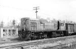 Diesellok 322 (General Electric, 1300 PS) vor einem Güterzug in Cali, der Hauptstadt des kolumbianischen Departamentos Valle del Cauca und nach der Einwohnerzahl drittgrößte Stadt des Landes. Nach einer Studie ist sie die gefährlichste Stadt Kolumbiens mit einer Mordrate von 45 Toten auf 100.000 Einwohner. (01.12.1971) <i>Foto: Jörg Schulze</i>