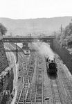 01 011 vom Bw Hagen-Eckesey fährt mit dem D 265 (Basel SBB - Hagen Hbf) in Wuppertal-Elberfeld ein. Von 1927 bis 1937 existierte eine Lücke im Nummernplan der Baureihe 01, die für die mit vielen Erwartungen erbaute H 02 1001 (Hochdrucklok) freigehalten worden war, die sich aber dann als Flop herausstellte. 1937 konnte die Lücke durch den Umbau der 02 001 geschlossen werden, die die freie Nummer 01 011 erhielt.    (08.08.1959) <i>Foto: Ernst Winter</i>
