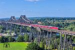 Die zwischen 1911 und 1913 erbaute Stahlbrücke über den Nord-Ostsee-Kanal in Rendsburg war schon immer ein beliebtes Fotoobjekt. Die Drohnentechnik ermöglicht heuzutage ganz neue Perspektiven auf die Brücke. EB 3204 der DSB ist mit dem ECE 397 aus København auf der Rendsburger Hochbrücke unterwegs. (21.07.2026) <i>Foto: Joachim Schmidt</i>