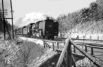 03 296 (Bw Osnabrück Hbf) mit einem Schnellzug auf dem Weg nach Bremen am winterlichen Nordrand der Lüneburger Heide bei Hittfeld. (02.1954) <i>Foto: Jürgen Hagemann</i>