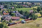 86 1744 mit einem Fotogüterzug aus Hoya in Bruchhausen-Vilsen Ost. (29.07.2026) <i>Foto: Joachim Schmidt</i>