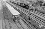 Während 03 074 vom Bw Mönchen Gladbach einen Leerwagenpark von Düsseldorf Abstellbahnhof zum Hauptbahnhof befördert, brummt ein VT 36 (mit VS 145) nach Remscheid-Lennep am "Abzw Emma" in Düsseldorf-Oberbilk vorbei.  (09.1959) <i>Foto: Ernst Winter</i>