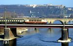 103 181 fährt mit IC 817 "Gorch Fock" (Kiel - Hamburg-Altona - Köln - Stuttgart - München) über die Moselbrücke nach Koblenz Hbf ein. Von der gegenüberliegenden Rheinseite grüßt die Burg Ehrenbreitstein. (17.03.1991) <i>Foto: Joachim Bügel</i>