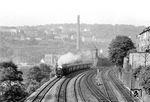 03 1082 (Bw Hagen-Eckesey) mit N 3814 nach Köln in Wuppertal Zoologischer Garten. Im Hintergrund sieht man das Stellwerk "Z", das neben der Funktion einer Blockstelle   der Fern- und Ortsgleise auch für die Einfädelung der Züge vom/zum Vorbahnhof in Wuppertal-Steinbeck diente. (05.1960) <i>Foto: Ernst Winter</i>