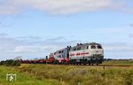 Das gemischte weiß/schwarze Doppel 218 341 und 218 497 mit AS 1429 nach Niebüll in der "planmäßigen Fotowolke" zwischen Keitum und Morsum. (24.08.2026) <i>Foto: Joachim Bügel</i>