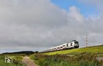 248 503 mit Tz 1810 vor dem ICE 2375 nach Frankfurt/M auf dem Hindenburgdamm östlich von Morsum. Auch bei diesem Zug findet weiterhin der störende Lokwechsel in Itzehoe statt, den man eigentlich bei den neuen Zügen vermeiden wollte. Der Dual Mode Vectron schafft allerdings nur 160 km/h, für die schnelleren Fahrten unter dem Fahrdraht wird daher auf einen anderen Vectron umgespannt, der natürlich aus dem Leih-Lokpool kommt, weil man die eigenen passenden E-Loks bereits verschrottet hat. (30.08.2026) <i>Foto: Joachim Bügel</i>