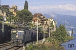 SBB/CFF Ae 6/6 11473 mit einem Güterzug am Genfer See in St. Saphorin (zwischen Lausanne und Montreux). (06.06.1999) <i>Foto: Christoph Weinkopf</i>