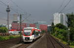 Die Strecke Mettmann - Kaarst wird von der Regiobahn mit Sitz in Mettmann bedient. Nach einem heftigen Regenschauer taucht Regio VT 1009-1 als S 28 nach Kaarst in Düsseldorf-Hamm auf.  (07.07.2012) <i>Foto: Joachim Bügel</i>