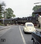 65 014 verlässt mit einem geschobenen Personenzug von Düsseldorf nach Essen den Bahnhof Essen-Werden. (27.07.1963) <i>Foto: Willi Marotz</i>