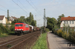 155 243 mit CS 49155 aus Wanne-Eickel auf der Güterzugstrecke in Opladen. Das Gebäude rechts ist übrigens das ehemalige Lokleitungsgebäude des Bw Opladen. (11.09.2010) <i>Foto: Joachim Bügel</i>
