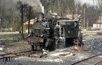 99 6102 (Baujahr 1914) ergänzt ihre Wasservorräte im Bahnhof Alexisbad. (04.04.1977) <i>Foto: Joachim Bügel</i>