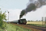 44 0194 schiebt einen Güterzug zwischen Sangerhausen und Riestedt nach. (14.05.1977) <i>Foto: Wolfgang Bügel</i>