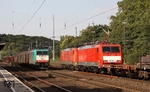 Von Aachen kommend begegnet SNCB 2825 (E 186 217) einem Stahlzug mit 189 041 und 189 087 in Köln-West.  (16.08.2013) <i>Foto: Wolfgang Bügel</i>