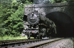 Hinter 044 212-9 verbirgt sich eigentlich 44 1211 vom Bw Ehrang, die nach Durchfahren des 504 m langen Reilerhals-Tunnels bei Pünderich wieder ans Tageslicht kommt. (27.07.1969) <i>Foto: Robin Fell</i>