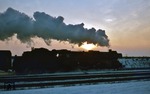 Auf der Strecke Aschersleben - Halberstadt fährt 03 2105 mit P 9336 bei Nachterstedt-Hoym in den Sonnenuntergang. (19.02.1978) <i>Foto: Wolfgang Bügel</i>