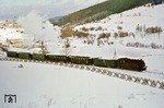 99 1771 mit P 14311 unterwegs im Grenzgebiet bei Unterwiesenthal. Der Hang hinter dem Zug befindet sich bereits in der damaligen Tschechoslowakei (heute: Tschechische Republik). (01.01.1978) <i>Foto: Wolfgang Bügel</i>