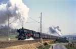 Mit der Schubunterstützung zweier 50er bringt 50 610 (Bw Düren) den Kohlezug Gdg 6174 über die Steigung von Herzogenrath nach Kohlscheid. (12.04.1968) <i>Foto: Robin Fell</i>