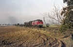 In Richtung Braunschweig ist 216 032 mit einem Güterzug bei Vechelde unterwegs. (05.01.1974) <i>Foto: Joachim Bügel</i>