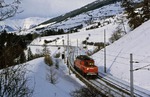 ÖBB 1020.07 (ex E 94 033) auf dem Weg vom Brenner zurück nach Innsbruck bei Matrei. (14.01.1987) <i>Foto: Joachim Bügel</i>