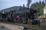 023 054 (Krupp, Baujahr 1955) wartet vor P 2458 nach Trier auf Ausfahrt im Bahnhof Bullay. (25.09.1970) <i>Foto: Robin Fell</i>