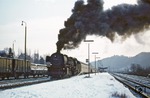 Vor der Ausfahrt des E 1867 nach Koblenz räuchert 001 199 den Bahnhof Bullay kräftig ein. (02.1970) <i>Foto: Robin Fell</i>