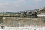 Bei Pößneck ist 65 1088 mit P 3034 (Saalfeld - Leipzig) unterwegs. (28.02.1977) <i>Foto: Peter Schiffer</i>