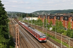 420 955 und 420 415 fahren als S 68 nach Langenfeld/Rhld aus dem Bahnhof Wuppertal-Vohwinkel. (08.06.2015) <i>Foto: Joachim Bügel</i>
