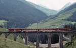 Ein Pendelzug mit einer Deh 4/4 auf dem Val Bugnei Viadukt auf der FO-Strecke Andermatt - Disentis. (21.06.1993) <i>Foto: Ulrich Neumann</i>