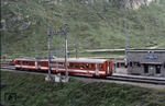BDeh 42 mit Pendelzug 321 im Bahnhof Oberalppasshöhe, mit 2033 m der höchste Punkt auf der Strecke St. Moritz - Zermatt.  (03.07.1993) <i>Foto: Ulrich Neumann</i>
