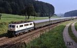111 041 mit D 722 (Berchtesgaden - Dortmund) bei Traunstein, als auf der Strecke München - Salzburg noch die alte Oberleitung hing. (12.09.1979) <i>Foto: Peter Schiffer</i>