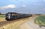 110 344 mit einem Eilzug nach Rotterdam zwischen Köln-Ehrenfeld und Pulheim. (02.08.1979) <i>Foto: Peter Schiffer</i>
