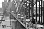 38 2642 vom Bw Euskirchen auf der zum 77. Deutschen Katholikentag geflaggten Hohenzollernbrücke in Köln. (08.1956) <i>Foto: Fischer</i>