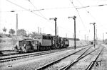 Ein Lokzug mit Köf 6187 (Gmeinder, Baujahr 1954), 50 3001 (WLF, Baujahr 1942) und 94 108 (Esslingen, Baujahr 1921) in Höhe des Aw Stuttgart-Bad Cannstatt. Im Hintergrund rauscht noch eine E 18 vorbei. (07.1956) <i>Foto: Kurt Eckert</i>