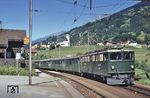RhB Ge 6/6II 705 mit einem Personenzug im Bahnhof Tavanasa-Breil/Brigels. (22.07.1985) <i>Foto: Peter Schiffer</i>