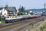 In der bayrisch weiß-blauen Farbgebung fährt die Münchener 111 016 vor FD 210 "Wörthersee-Express" (Klagenfurt - Dortmund) durch Boppard. (04.07.1983) <i>Foto: Wolfgang Bügel</i>