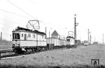 Tw 20 (Fuchs, Baujahr 1928) der Oberrheinischen Eisenbahn-Gesellschaft (OEG) mit einem Güterzug im OEG-Güterbahnhof Heidelberg. Rechts steht Tw 18, dahinter Bw 166. (28.11.1957) <i>Foto: Kurt Eckert</i>
