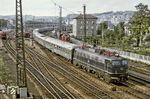 110 292 (Bw Stuttgart) verlässt mit einem Schnellzug nach München den Ulmer Hbf. (09.1970) <i>Foto: Tim Howerter</i>