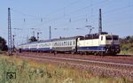 181 213 mit dem Saisonschnellzug D 1273 (Köln - Port Bou/Nizza) bei Porz-Wahn. (30.08.1991) <i>Foto: Peter Schiffer</i>