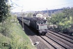 117 107 befördert den D 593 (Hamburg - Würzburg - Stuttgart), der ab Heilbronn vereinigt mit E 2355 (Frankfurt - Heilbronn - Stuttgart) fuhr, bei Lauffen am Neckar. (28.04.1975) <i>Foto: Peter Schiffer</i>