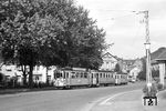 Tw 57 mit Bw 142 und 129 auf der Linie 8 (Bahnhofstraße – Rohrbacher Straße – Rohrbach – Leimen – Nußloch – Wiesloch) in Heidelberg. (23.09.1956) <i>Foto: Helmut Röth *</i>