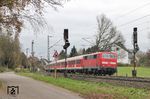111 014 mit RB 11975 (Wuppertal - Köln), der letzten Bn-Garnitur, die zu DB-Zeiten auf der RB 48 verkehrte, bei Solingen. (17.11.2010) <i>Foto: Joachim Bügel</i>
