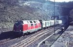 V 200 074 (Bw Hamm) fährt mit einem Eilzug aus dem Rehberg-Tunnel kommend nach Altenbeken ein. (04.1968) <i>Foto: Robin Fell</i>