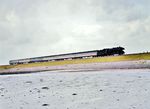 Eine Altonaer 03 vor E 1774 aus Westerland auf dem Hindenburgdamm östlich von Morsum. (1963) <i>Foto: Reinhold Palm</i>